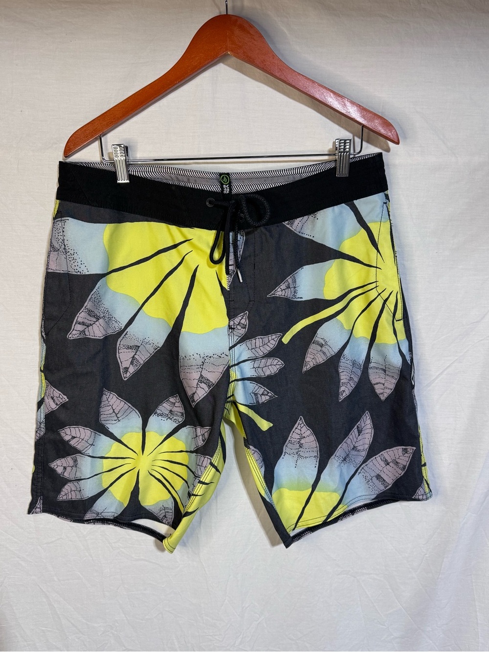 Volcom Black Swim Board Shorts with Yellow and Light Blue Floral Print